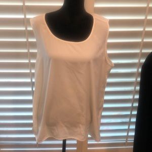 Chico’s white tank top with interesting side detailing. Washable.  Good basic.